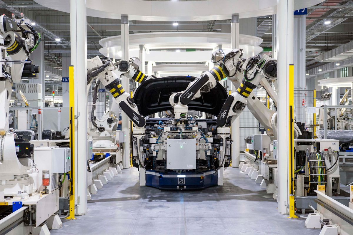 Robotic assembly of a car on an automotive production line