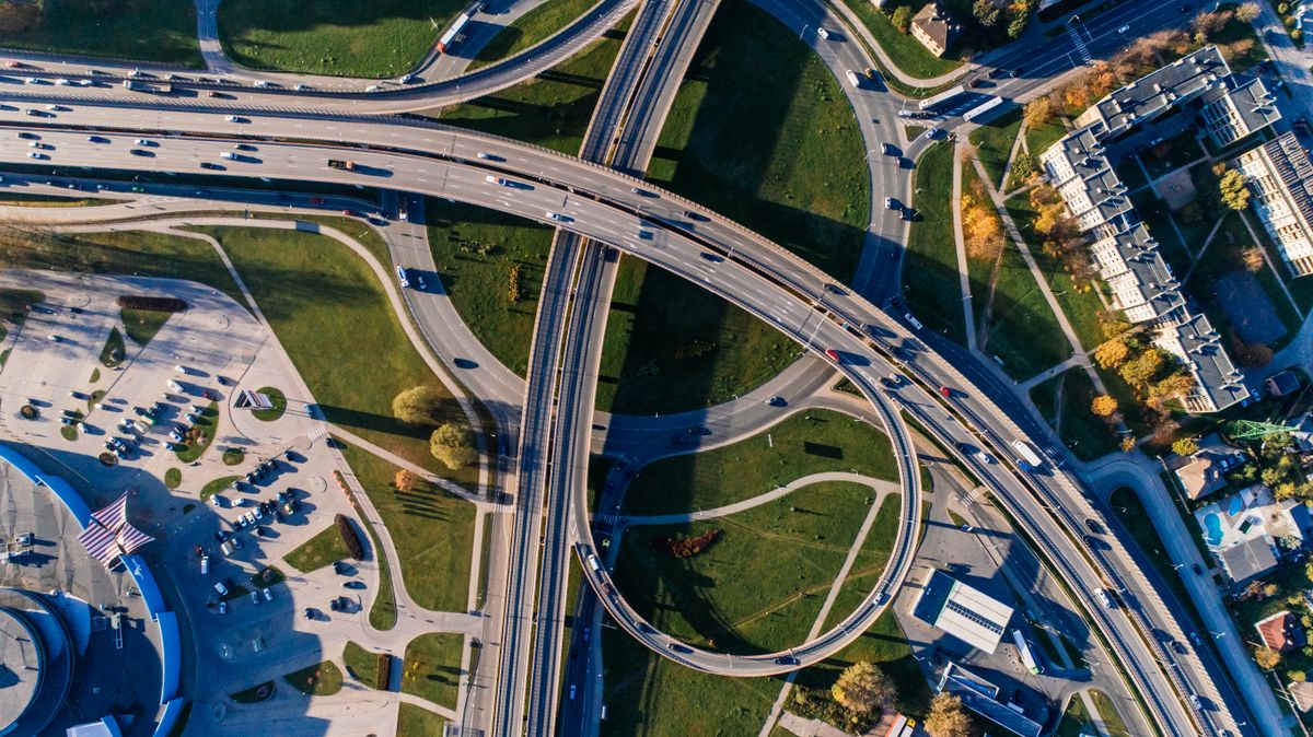 Aerial view of a multi-level highway interchange and bridges